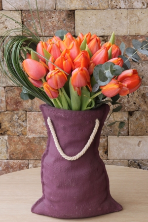 Orange Tulips in Stone Vase